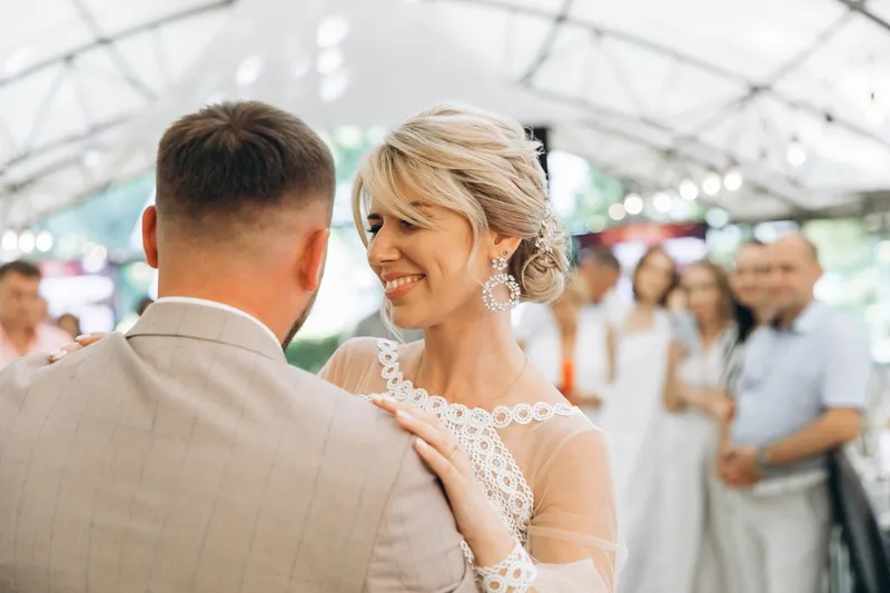 Bride and groom dancing at the wedding reception