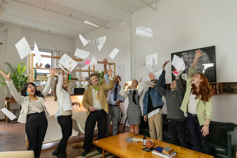 Diverse team celebrating together at a company event